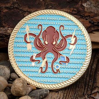 Gold-rimmed challenge coin featuring a maroon octopus holding a trident, lightning bolt, scroll, and book over a blue binary code background.