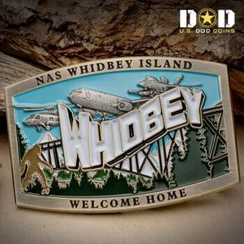 Rectangular challenge coin featuring NAS Whidbey Island, aircraft, a bridge, and a sasquatch silhouette against a blue and green landscape.