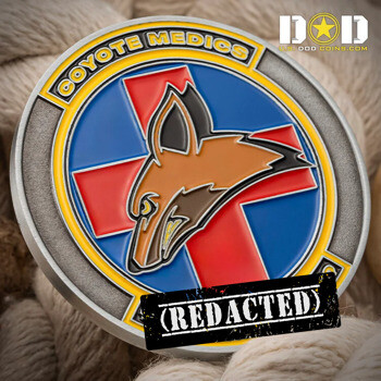 Challenge coin featuring the Coyote Medics name, a coyote head silhouette over a red medical cross and blue background with a yellow border.