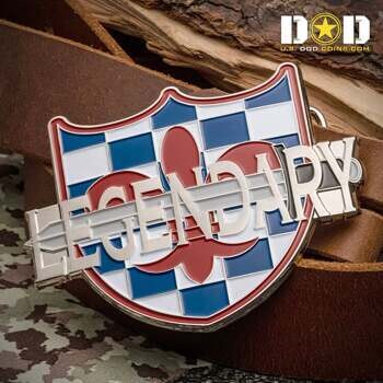 Shield shaped belt buckle featuring blue and white checkers, a red fleur-de-lis, and the word LEGENDARY in silver raised metal.