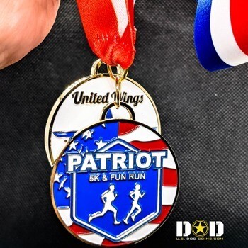 Patriot 5K & Fun Run medal featuring two runners on a blue shield over a US flag background with a red, white, and blue neck ribbon.