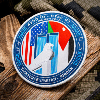 Task Force Spartan Jordan embroidered military patch featuring Twin Towers, US and Jordan flags, and an eagle motif.