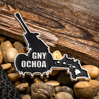 Custom black enamel lapel pin shaped like a geographic boundary featuring the text GNY OCHOA.