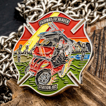 Maltese cross challenge coin featuring a firefighter in a golf cart with text reading Fairway to Heaven Station 107