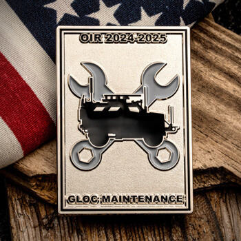 Rectangular challenge coin featuring GLOC Maintenance OIR 2024-2025 text with a vehicle silhouette over crossed wrenches.