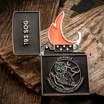 Lighter-shaped challenge coin featuring an owl in night vision gear, the 193 SOG text, and an orange enamel flame detail.