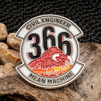 Circular challenge coin with a red bull and flames featuring the text 366 Civil Engineer Mean Machine.