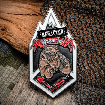 Mountain-shaped challenge coin featuring a roaring grizzly bear, red Breacher banner, and tactical equipment on a black background.