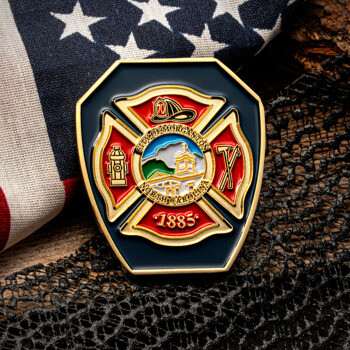 City of Morganton North Carolina fire department shield challenge coin featuring a red maltese cross on a black background next to an American flag.