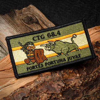 Rectangular embroidered patch featuring CTG 68.4 text, a cartoon soldier duck facing a bull, and a Latin motto on an olive and tan background.