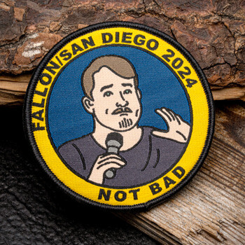 Circular embroidered patch featuring a man with a microphone, the text Fallon San Diego 2024, and Not Bad on a yellow border.