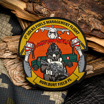 Embroidered patch for 1st SOLRS Fuels Management Flight Hurlburt Field FL featuring a bear with tactical gear, an aircraft, and a fuel truck.