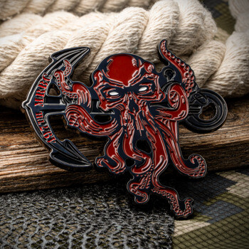 Custom lapel pin featuring a red octopus wrapped around a black anchor with 497TH MRBC text.