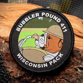 Circular embroidered patch for Bubbler Pound 411 Wisconsin Pack featuring a character drinking from a water fountain.