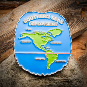 Scalloped edge challenge coin featuring a map of the Americas in green and blue enamel with red markers for Southern Seas Deployment.