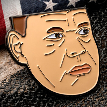 Soft enamel lapel pin featuring a stylized male portrait resting against an American flag and mesh background.