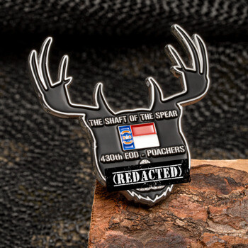 Deer head shaped lapel pin featuring 430th EOD Poachers text and a red and white flag emblem on a black background.