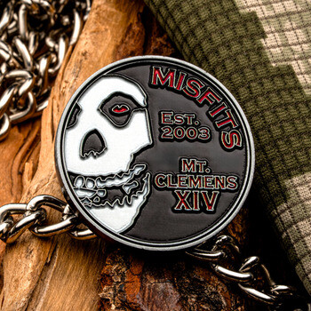 Circular challenge coin featuring the Misfits skull emblem, Est. 2003, and Mt. Clemens XIV text with attached metal chain.