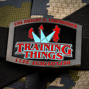 USS Dwight D. Eisenhower Training Things Deployment 2023 custom belt buckle with retro Stranger Things style lettering on black belt.