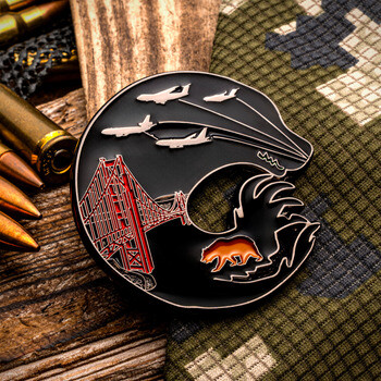 Custom challenge coin featuring the Golden Gate Bridge, formation aircraft, and a California bear silhouette against black enamel.