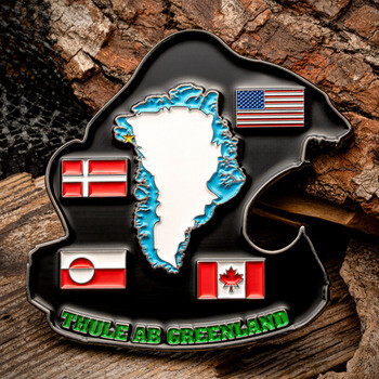Custom cut-out bottle opener challenge coin featuring Greenland, military base location, and flags of the US, Denmark, Greenland, and Canada.