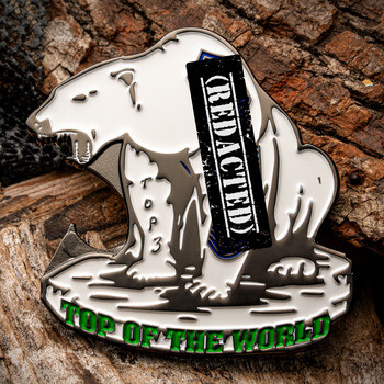 Polar bear shaped challenge coin with Top of the World and Top 3 inscribed on silver metal with enamel finish.