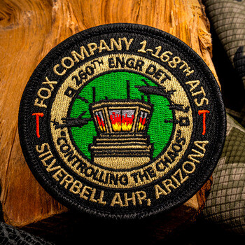 Embroidered patch for Fox Company 1-168th ATS Silverbell AHP, Arizona, featuring an air traffic control tower and helicopters.