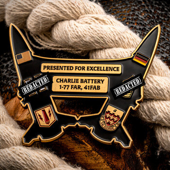 Custom cut-out challenge coin shaped as dual artillery shells for Charlie Battery 1-77 FAR, 41FAB featuring flags and military crests.