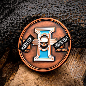 Antique copper challenge coin featuring an Inquisition emblem with a skull, blue enamel accents, and REDACTED banners.