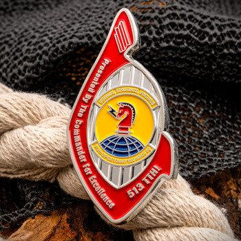 Custom cut-to-shape challenge coin for 513 TTH featuring Red Horse squadron insignia and Commander For Excellence banner.