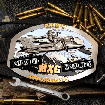 Detailed belt buckle featuring a cowboy riding a jet fighter with 2019 MPOY MXG Finals Champion lettering.