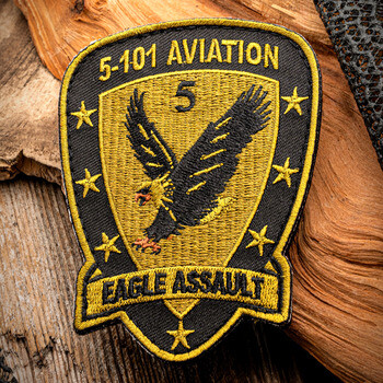 Embroidered military patch for 5-101 Aviation Eagle Assault featuring a flying eagle emblem with stars on black and gold background.