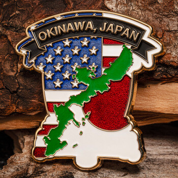 Custom enamel lapel pin featuring the American and Japanese flags, a green Okinawa island map, and an Okinawa, Japan banner.